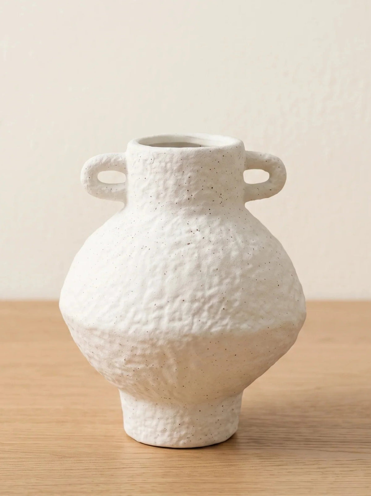 Speckled urn vase side view