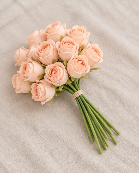 Peach Artificial Rosebud Bouquet, shown alone on a linen background