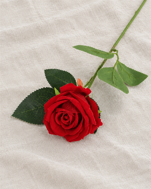 Red Artificial Rose, shown alone on a linen background