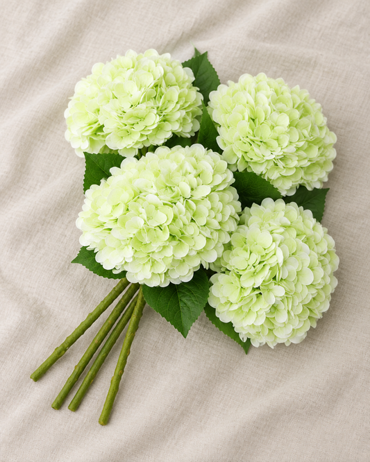 Pale Green Artificial Hydrangea Bouquet, shown alone on a linen background