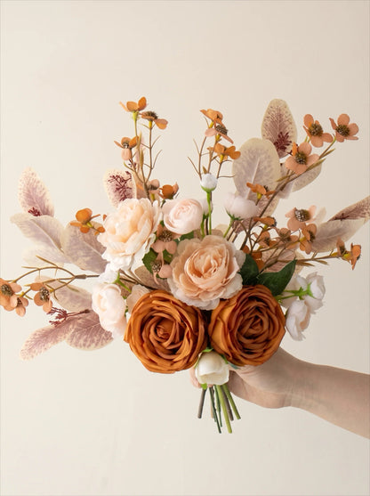 Apricot rose arrangement in a room