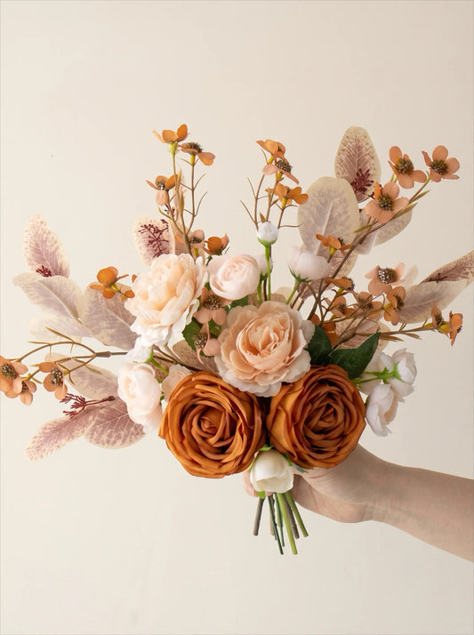 Apricot rose arrangement in a room