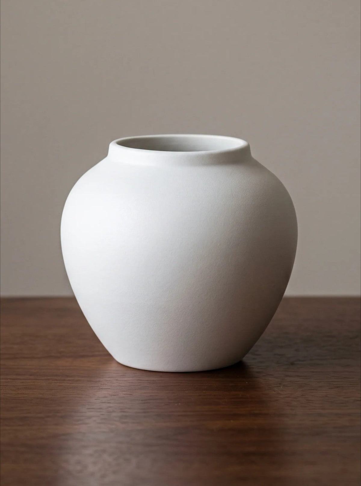 Wabi-sabi white sculptural ceramic vase