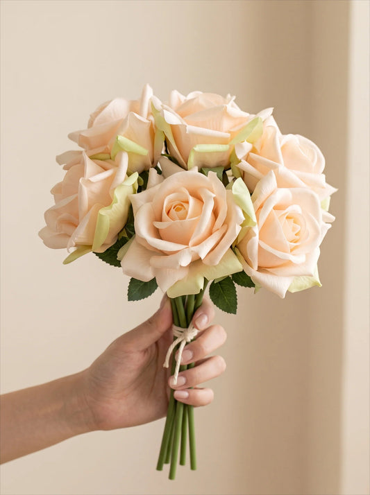 Champagne rose bouquet in a room