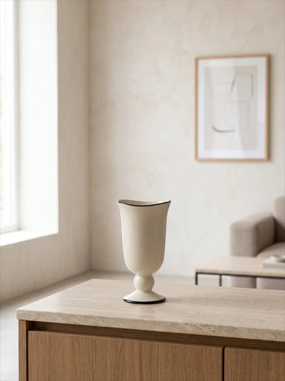 Parisian footed vase in a room