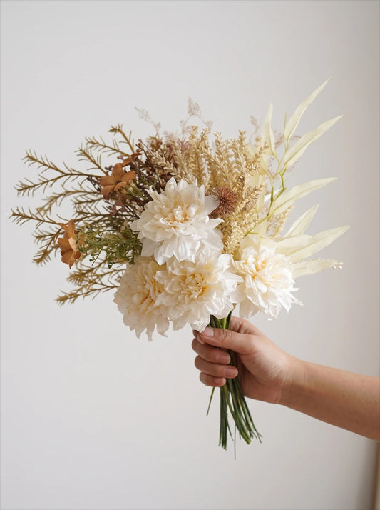 Cream and orange mixed artificial floral bouquet
