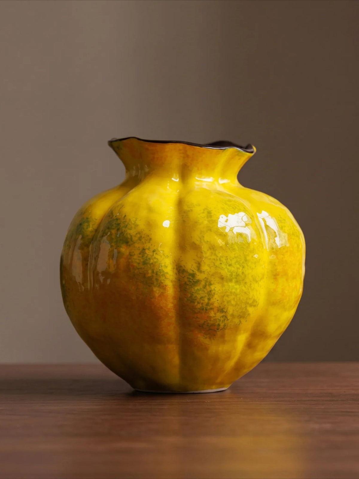 Fluted speckled glazed sculptural vase in yellow
