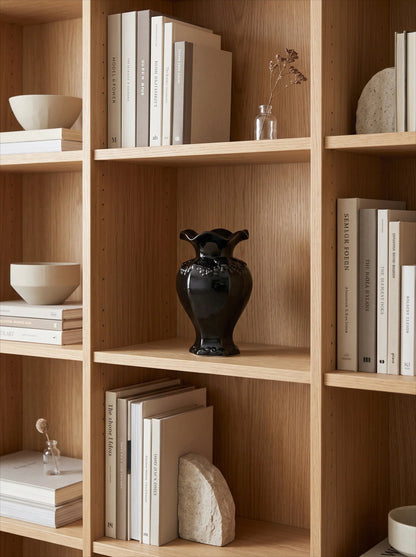 Ruffled black vase with flowers