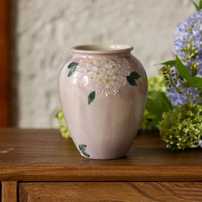 Lilac hydrangea vase in a room