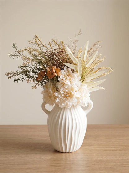 White double-handled vase detail