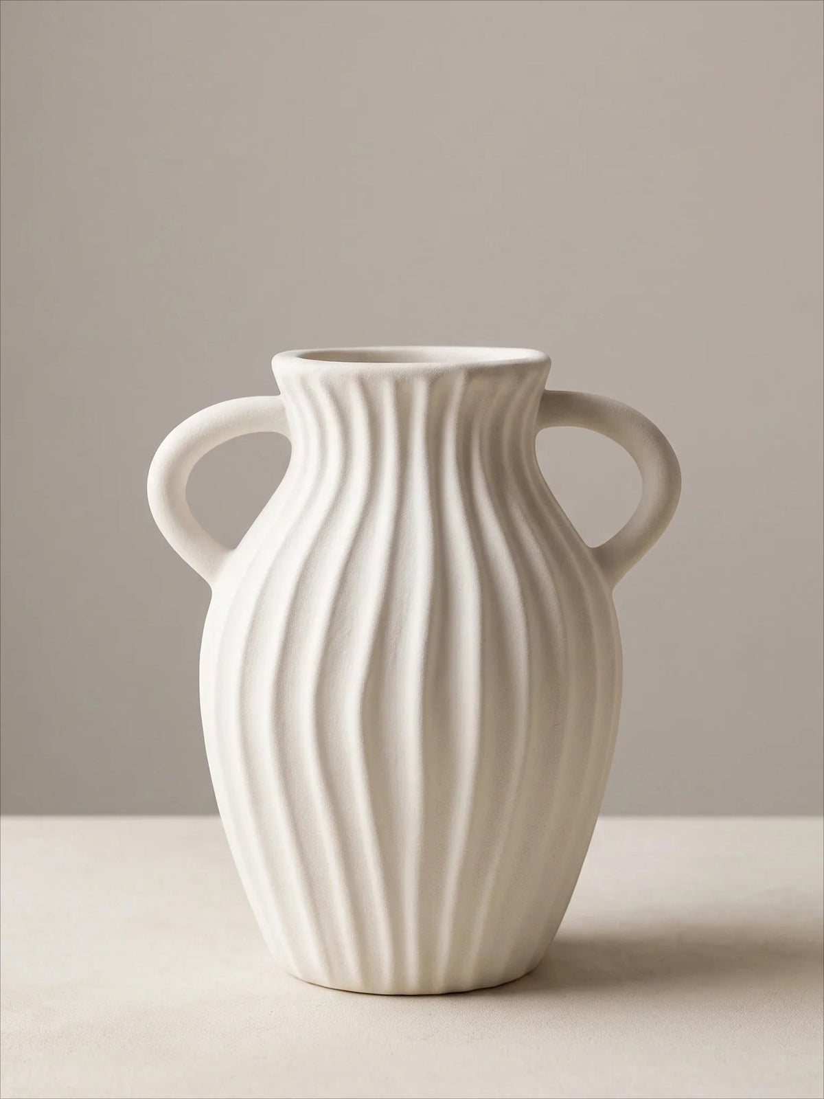 White double-handled textured ceramic vase