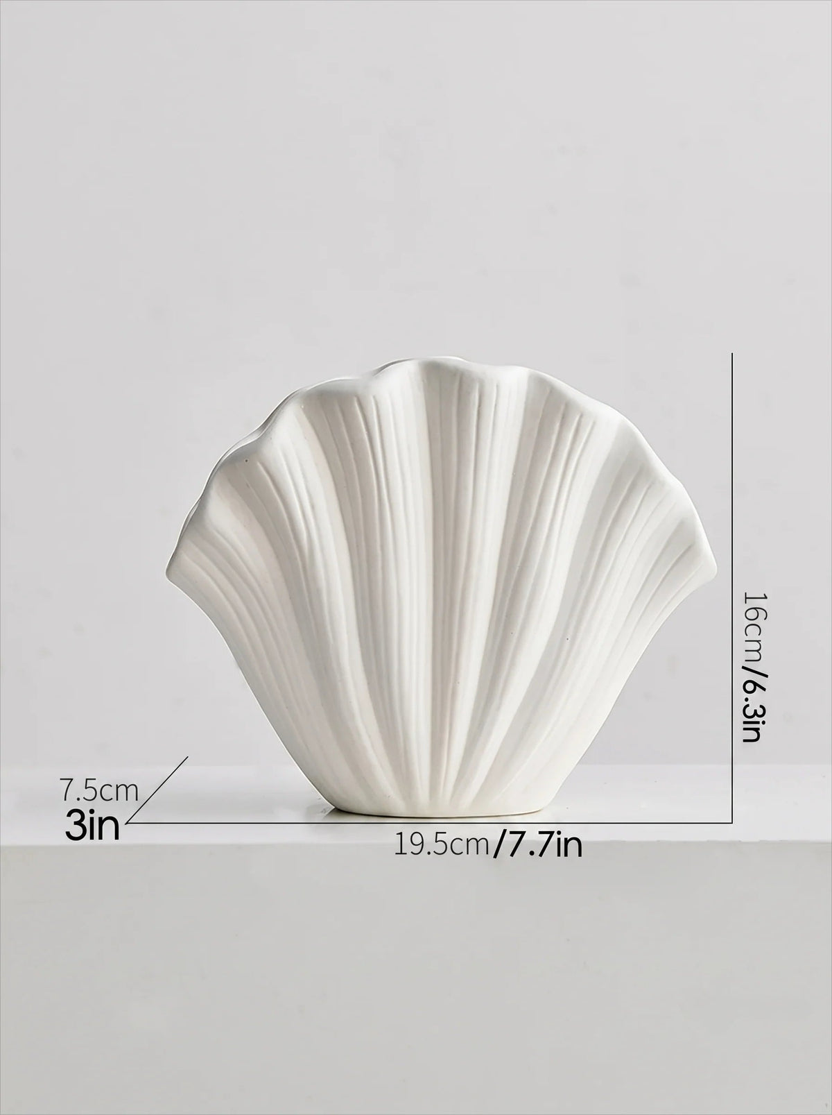 White shell vase in a room