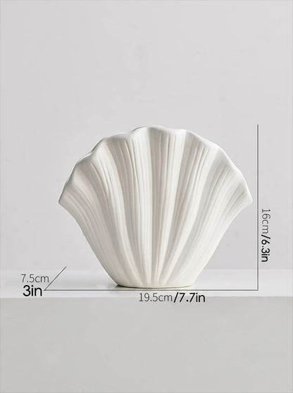 White shell vase in a room