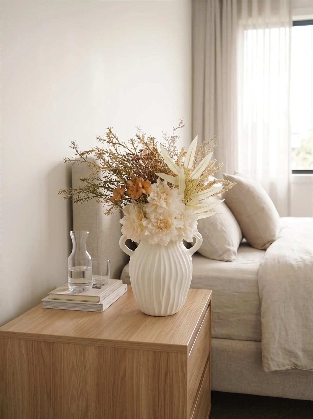 Cream and orange bouquet in a vase