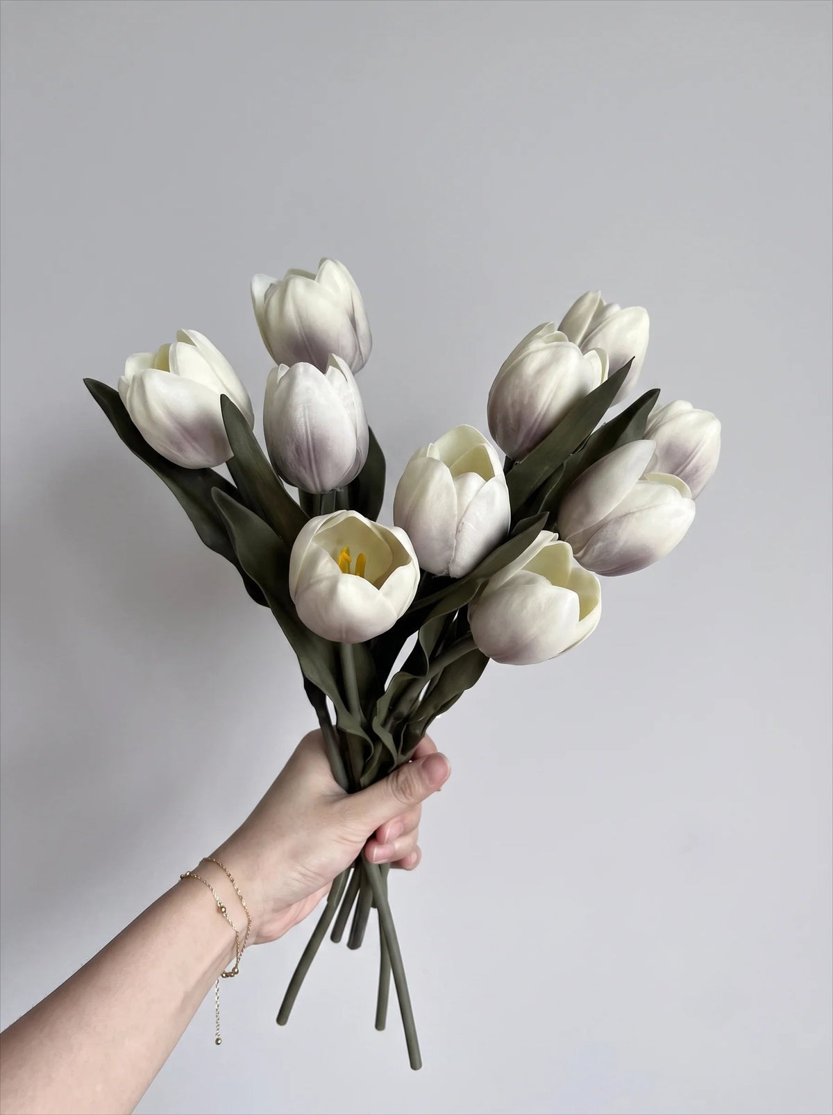 White tulip bouquet in a room