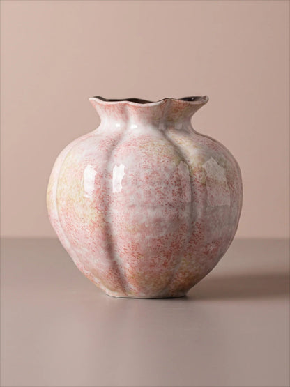 Fluted speckled vase side view