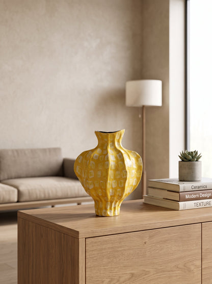 Yellow spotted vase close-up
