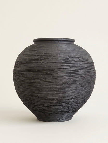 Black linear textured orb ceramic vase