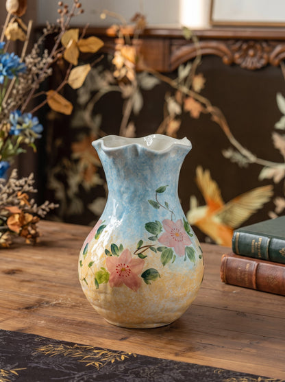 Pastel blue floral vase styled