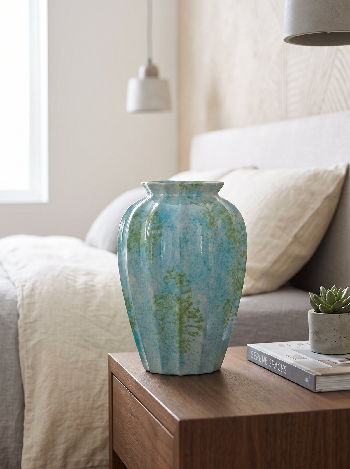 Ocean blue fluted vase on a shelf