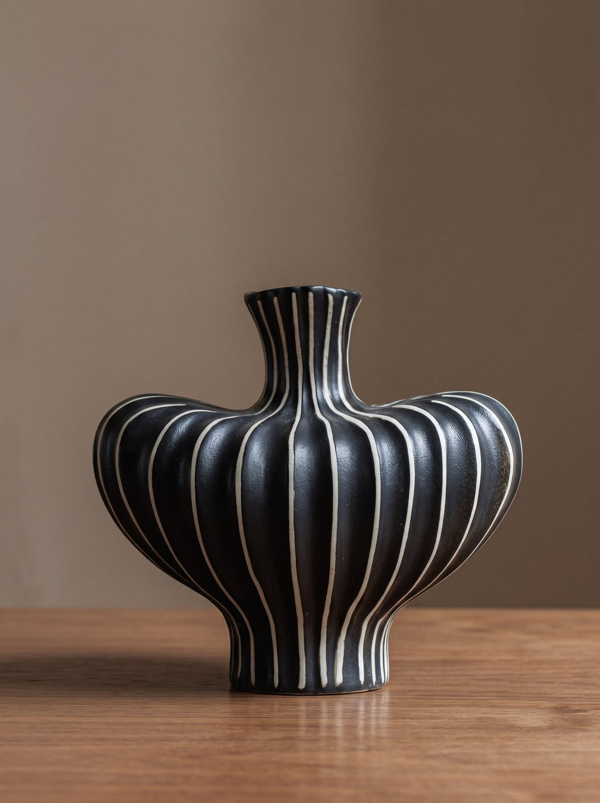 Striped sculptural vase detail