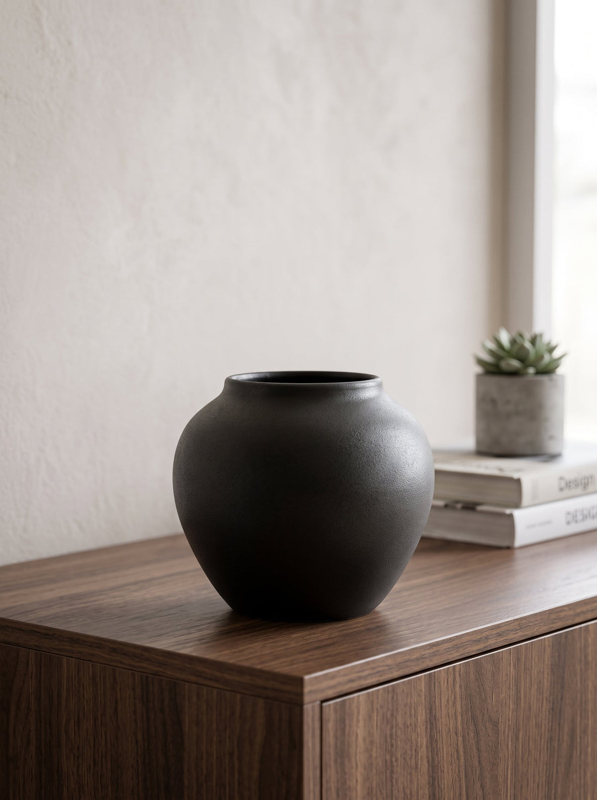 Black sculptural vase close-up