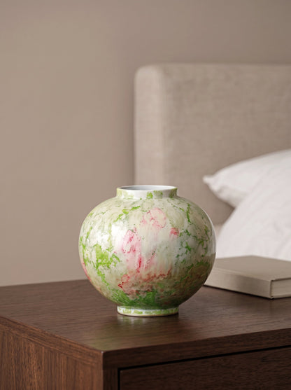 Green splash moon vase close-up