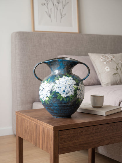 Blue hydrangea vase with flowers