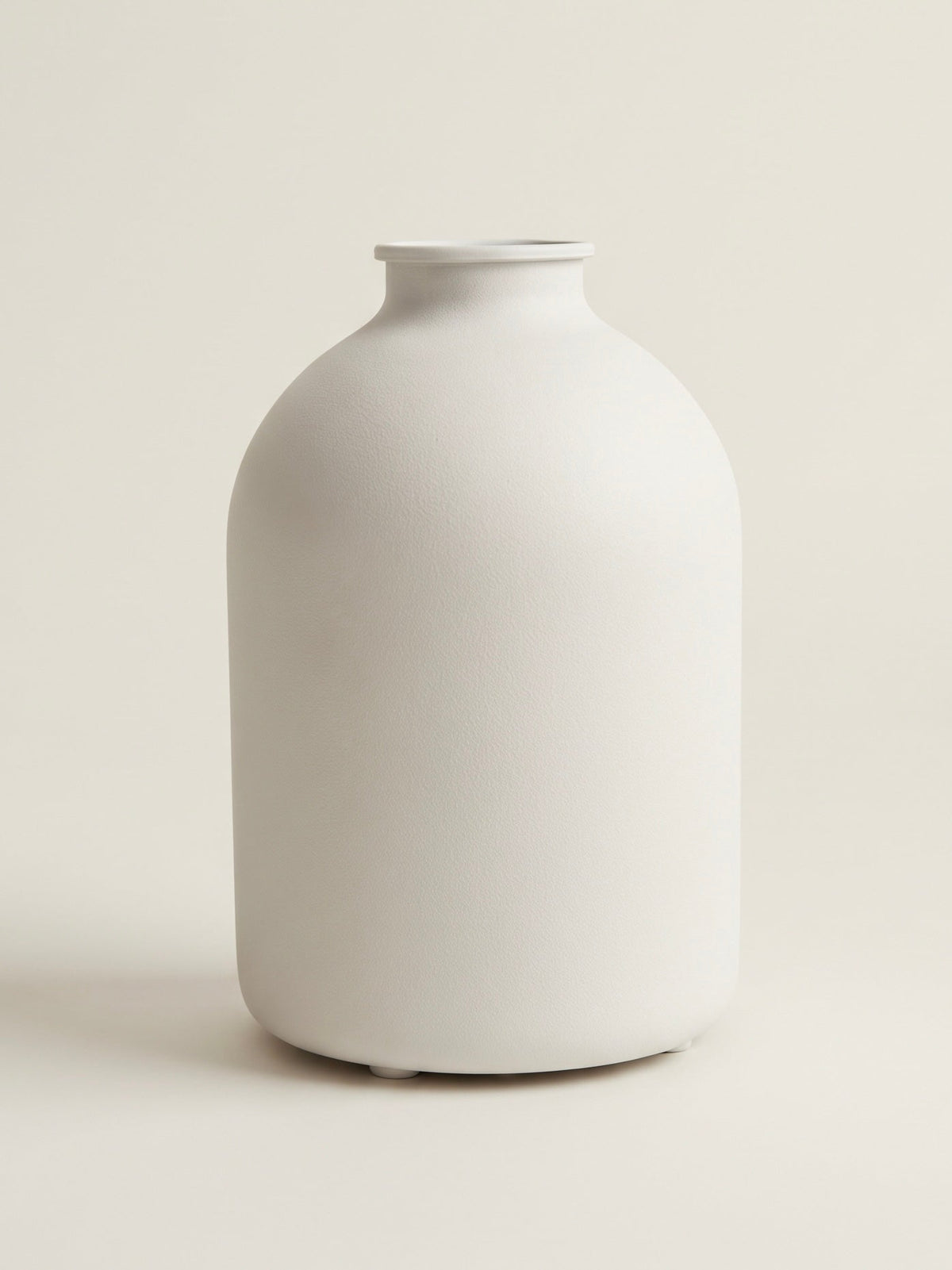 Matte ivory sculpted carafe ceramic vase