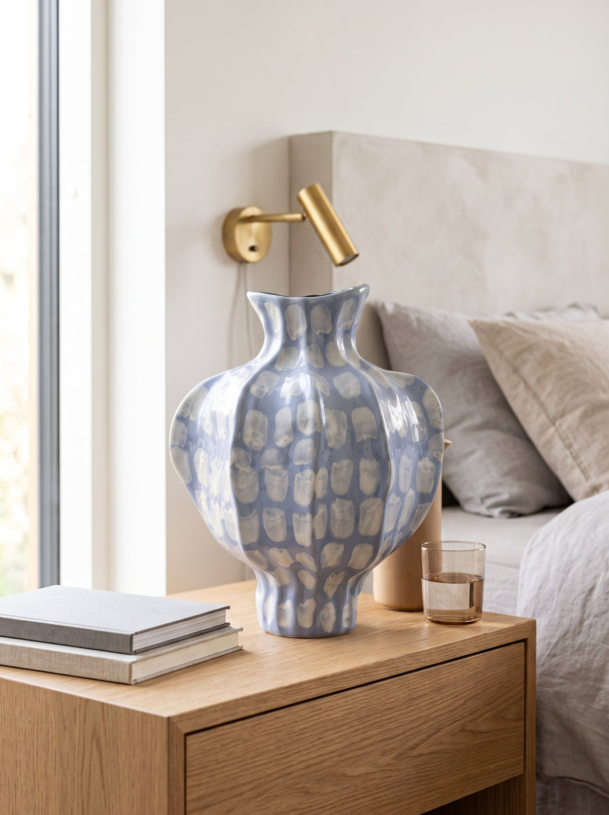 Blue spotted vase with flowers