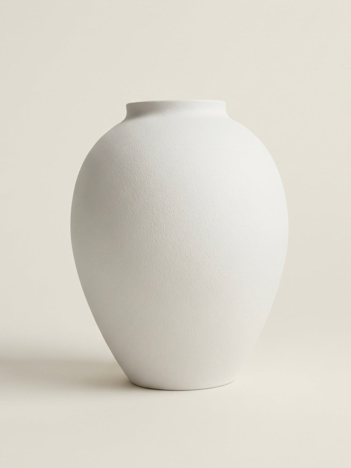 Textured matte white orb ceramic vase