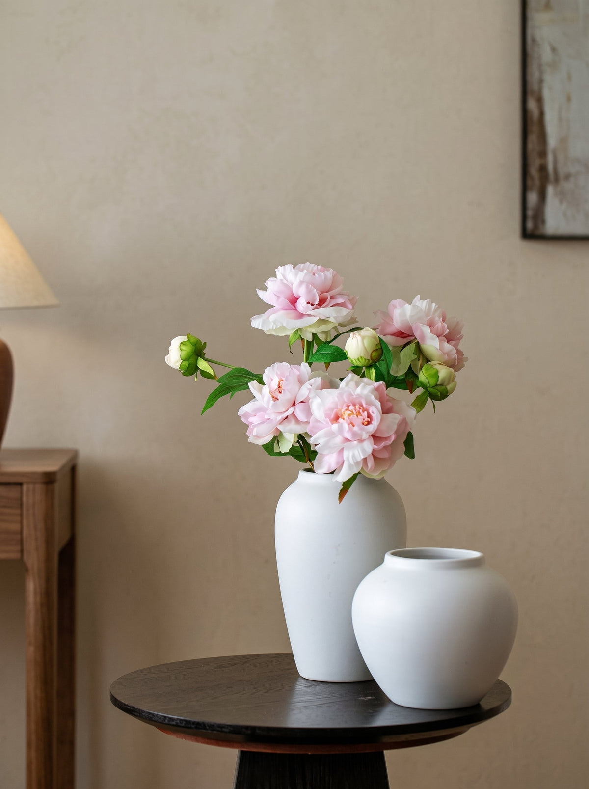 White sculptural vase styled