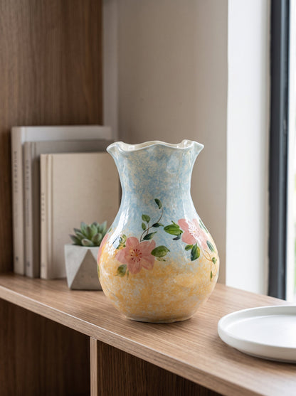 Pastel blue floral vase close-up