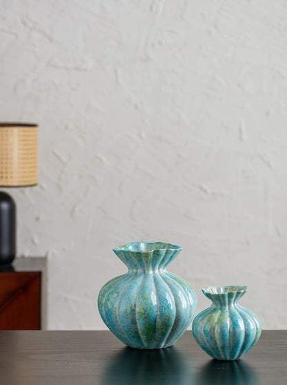 Mint blue fluted vase close-up