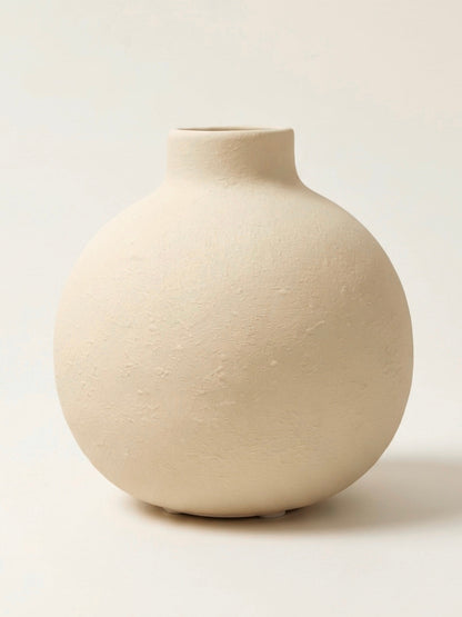 Creamy white textured globe vase