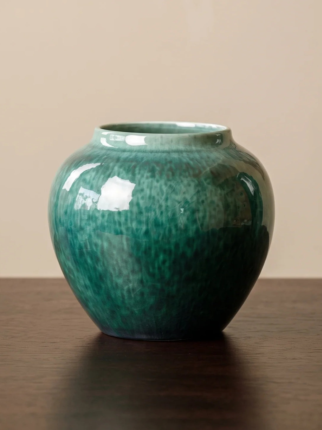 Emerald green glazed ceramic vase