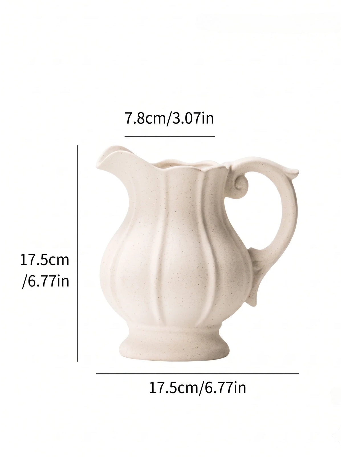 Speckled ceramic vase in a room