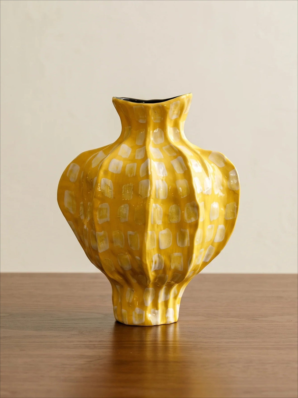 Fluted yellow spotted ceramic vase