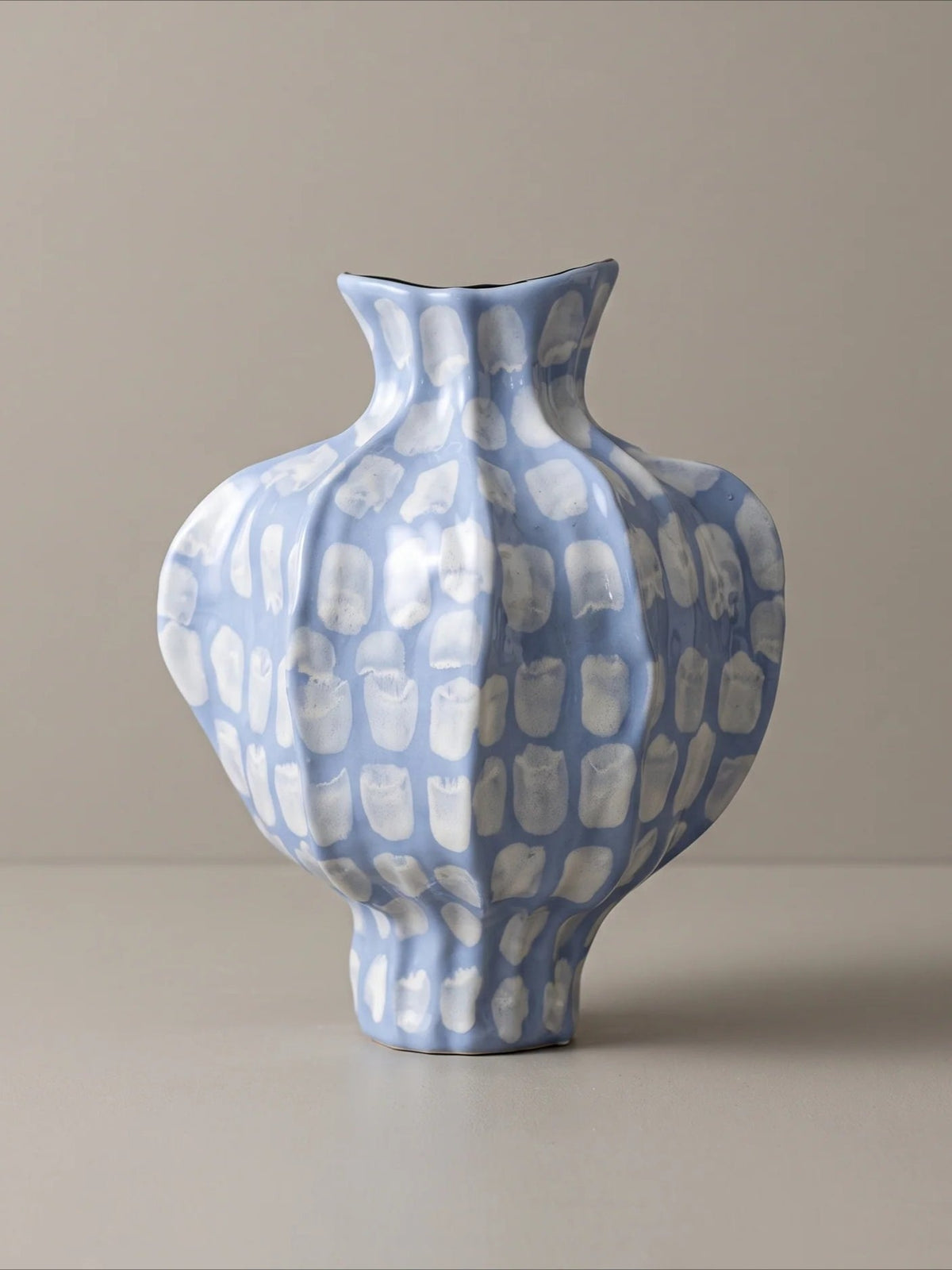 Fluted blue spotted ceramic vase