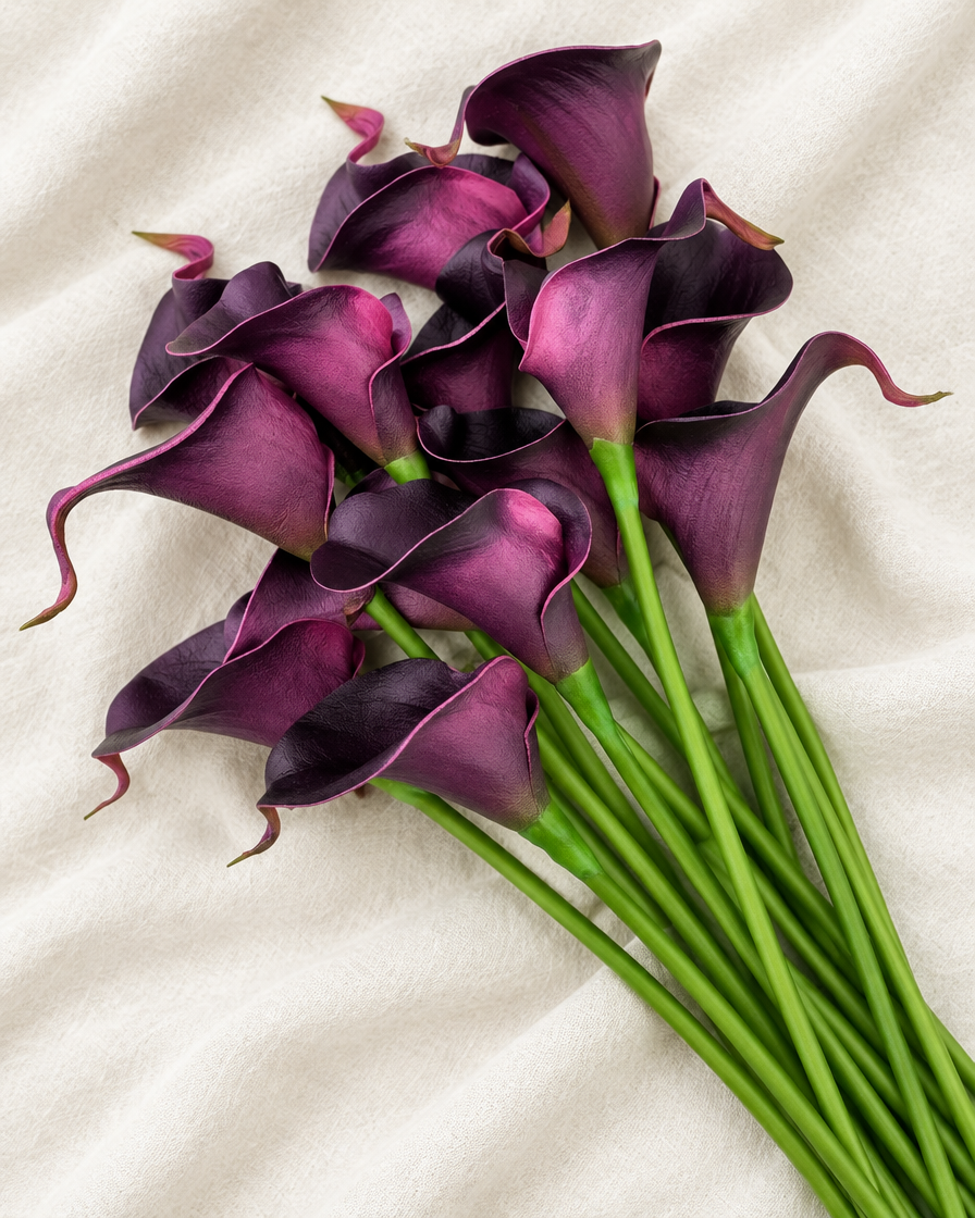 Dark Purple Artificial Calla Lily Bouquet in dark purple, shown alone on a linen background