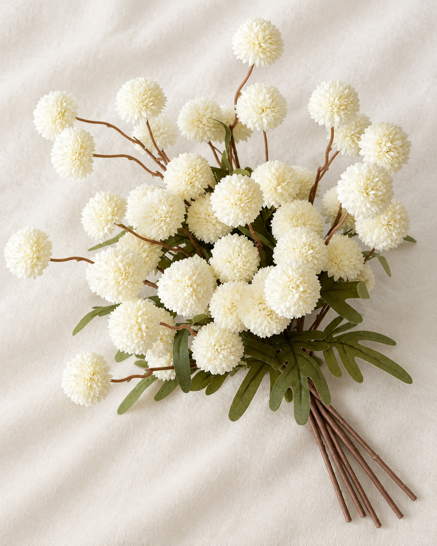 White Artificial Pom-Pom Flower Stems in white, shown alone on a linen background