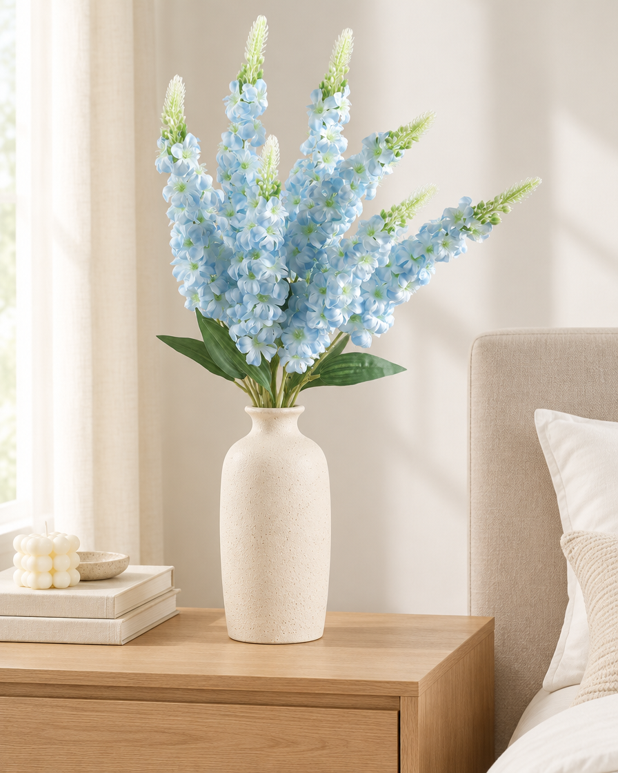 Light Blue Artificial Delphinium Flower Stems styled in a ceramic vase on a dresser (vase sold separately)