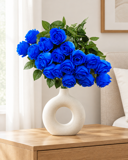 Royal Blue Artificial Rose Bouquet styled in a ceramic vase on a dresser (vase sold separately)