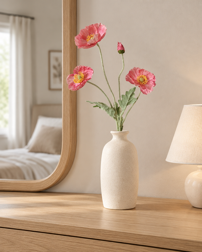Pink Artificial Poppy Stem styled in a ceramic vase on a dresser (vase sold separately)