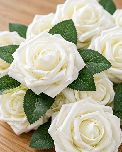Close-up detail of the ivory artificial rose set on an oak table
