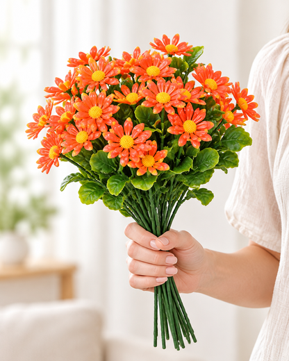 Orange Artificial Daisy Bunch held in a hand