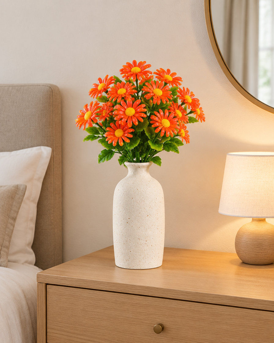 Orange Artificial Daisy Bunch styled in a ceramic vase on a dresser (vase sold separately)