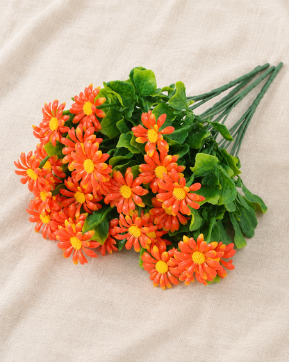 Orange Artificial Daisy Bunch, shown alone on a linen background