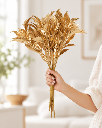 Gold Glitter Artificial Leaf Stems Bunch held in a hand