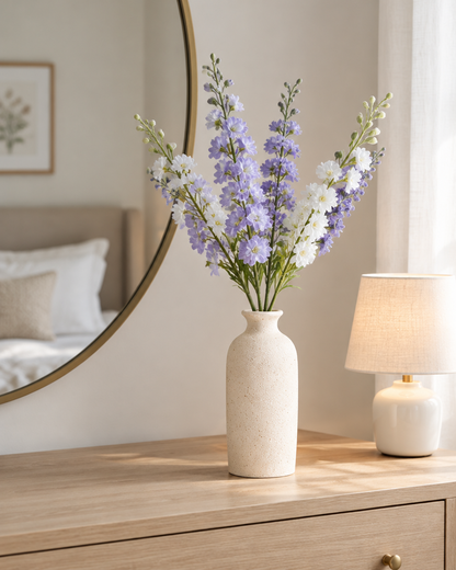 Lilac Purple Artificial Delphinium Flower Stems styled in a ceramic vase on a dresser (vase sold separately)